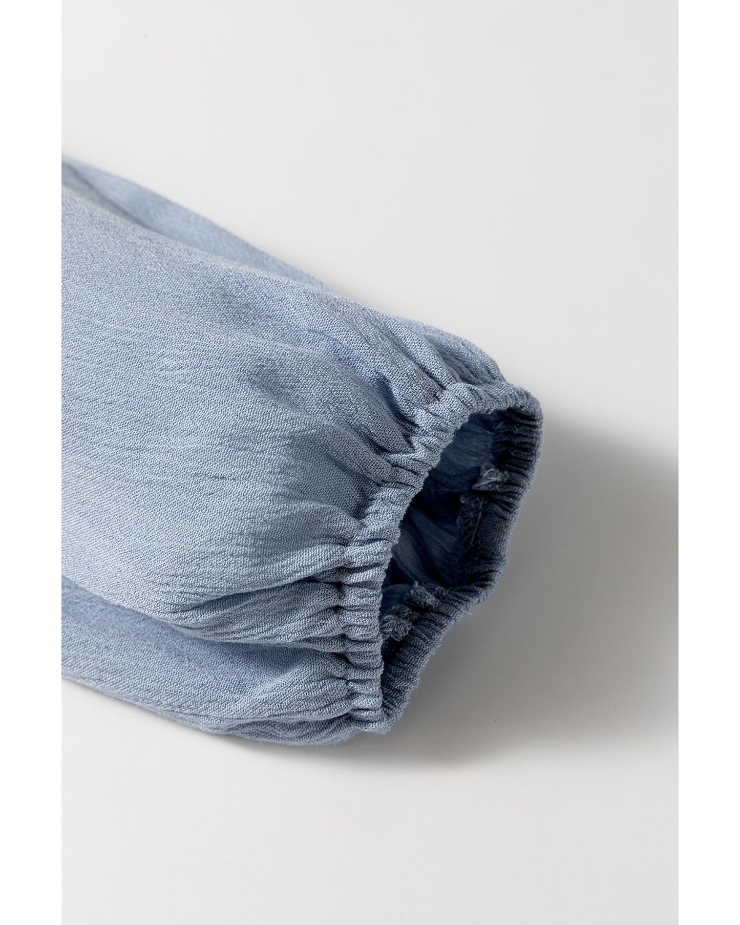 V Neck Smocked Tiered Mini Dress with Smocked Bodice and Tiered Skirt Detail