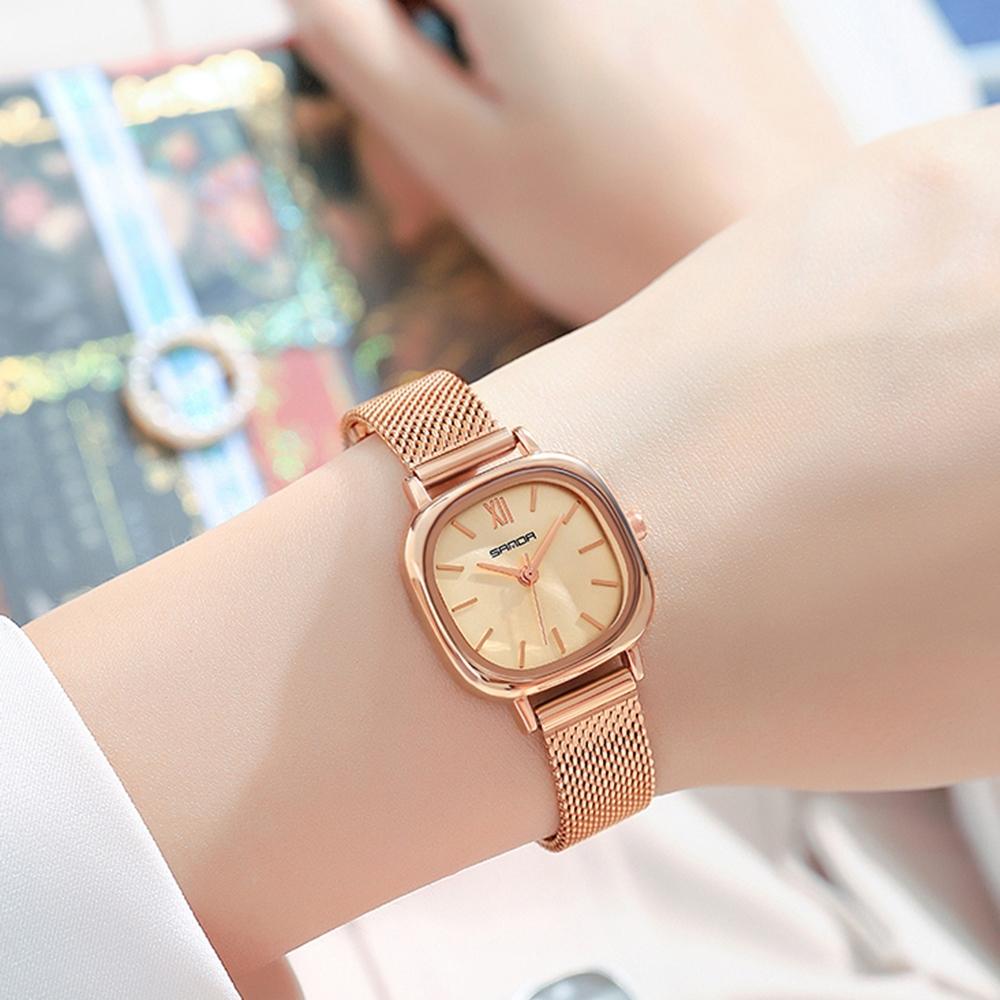 Women Oval Dial Quartz Watch with Simple Bar Scale and Stylish Metal Belt