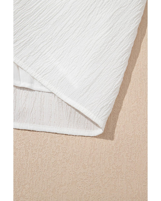 White Textured Ruffled Trim V-Neck Flutter Flowy Top