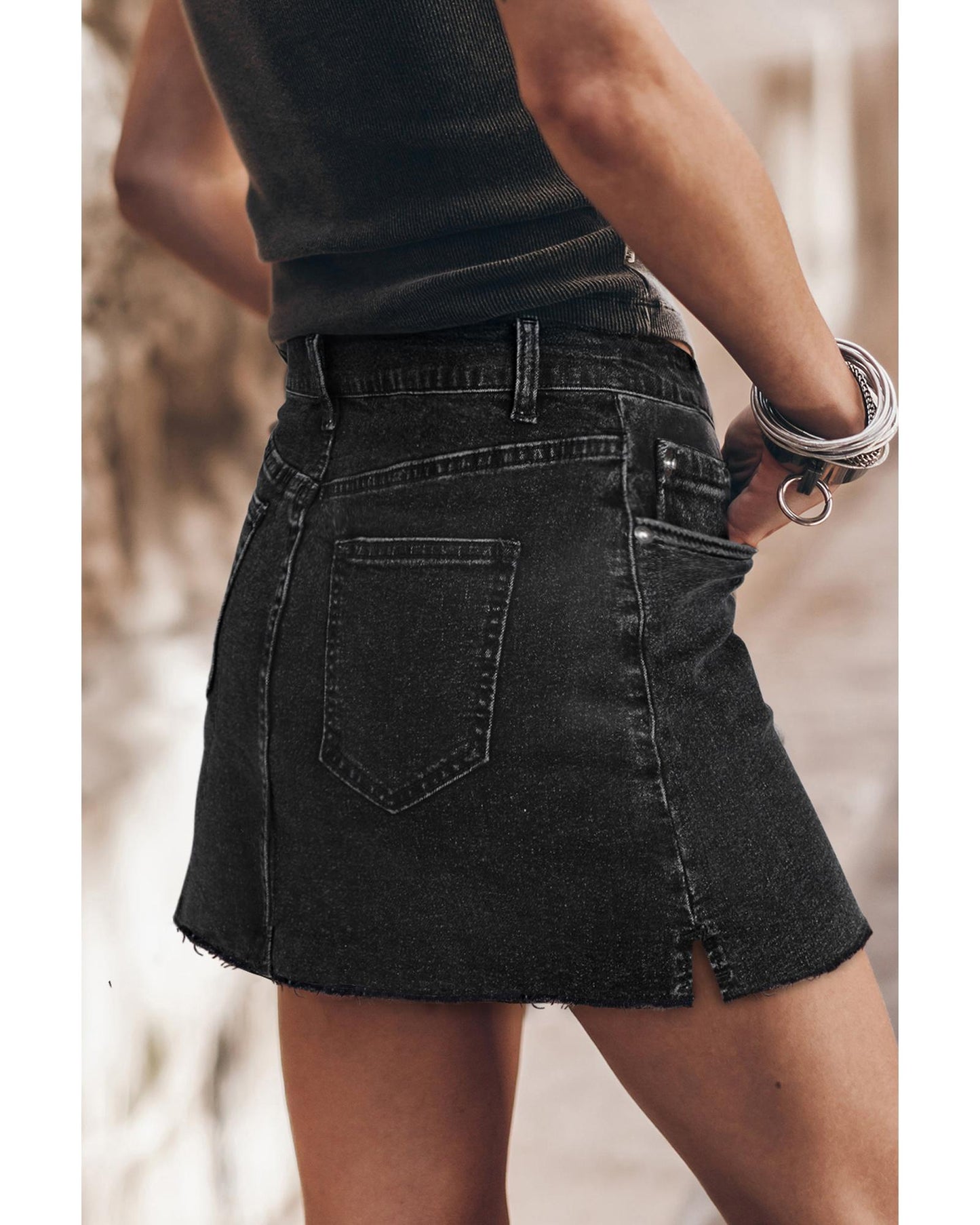 Mineral Wash Ripped Raw Hem Denim Mini Skirt