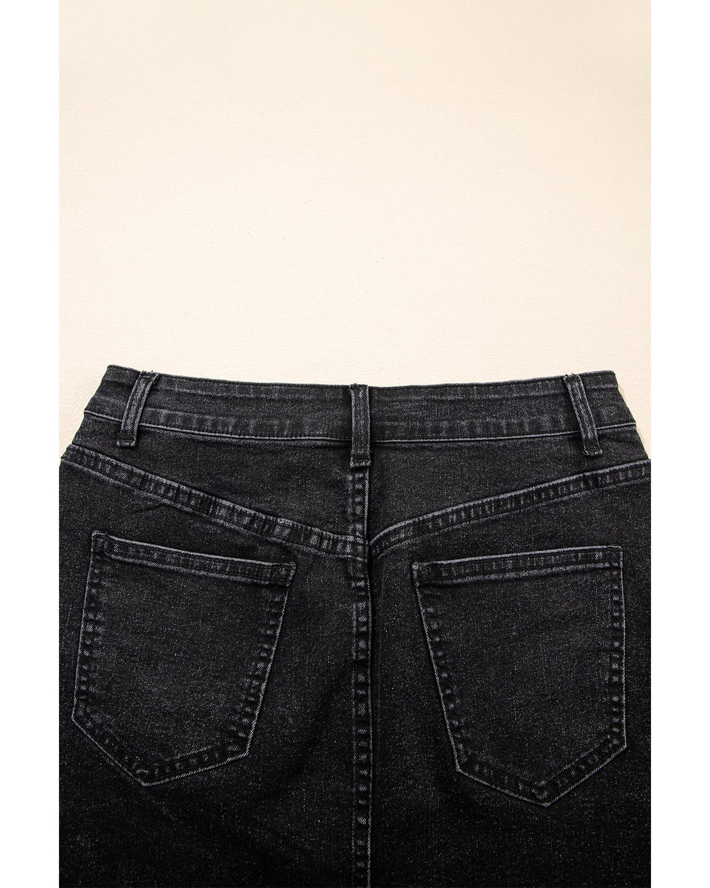 Mineral Wash Ripped Raw Hem Denim Mini Skirt